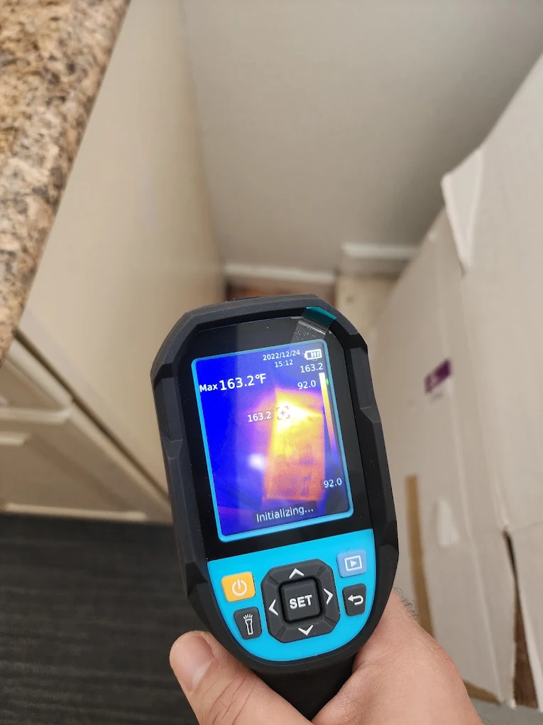 Mold testing in NJ: thermal imaging camera finding hidden moisture behind a wall
